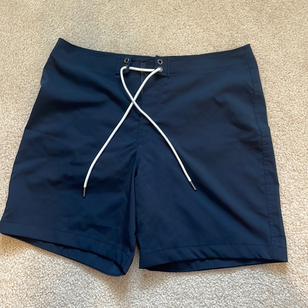 Abercrombie and Fitch navy swim trunks. Medium length, Size 30